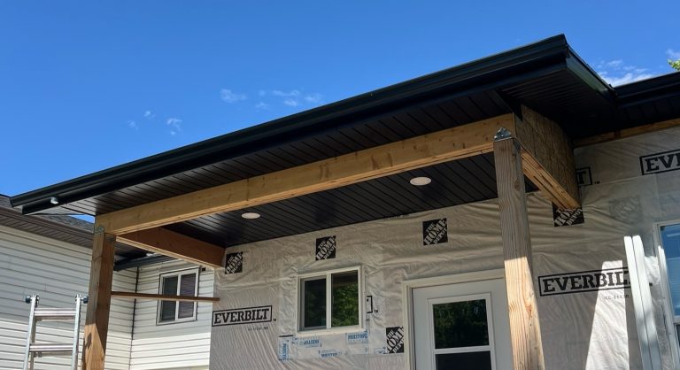 Soffit and fascia installation alongside gutters
